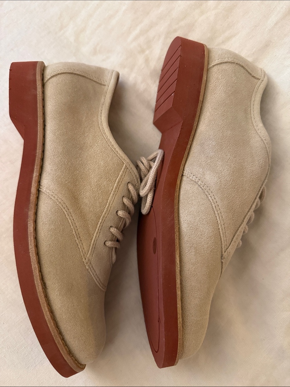 Beige Suede Lace-Up loafers.